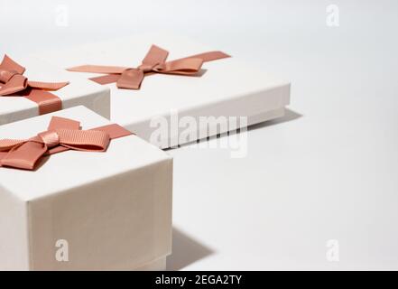 three white gift boxes on empty white background Stock Photo