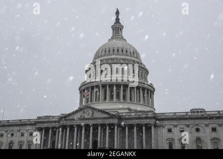 Bethesda, USA. 18th Feb, 2021. The U.S. Capitol is seen during sleet and freezing rain on Thursday, February 18, 2021, in Washington, DC. (Photo by Oliver Contreras/Sipa USA) Credit: Sipa USA/Alamy Live News Stock Photo