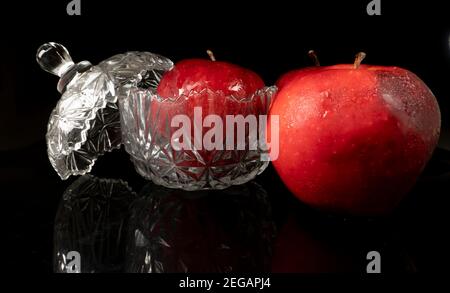 Red apples with water drops, isolated on black background Stock Photo