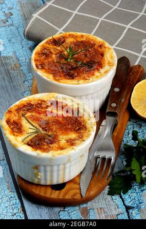 Delicious cod and cheese soup, creamy and warming, served in deep bowl ...