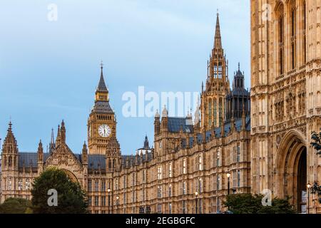 The Palace of Westminster (Houses of Parliament) on an autumn evening, the clock tower of Big Ben in the background, London, UK Stock Photo