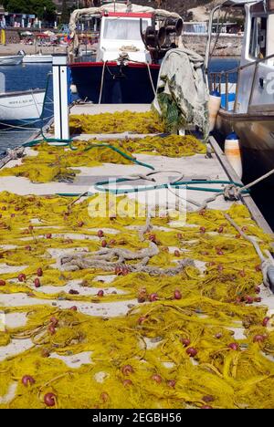 Fishing nets laid out to dry Stock Photo