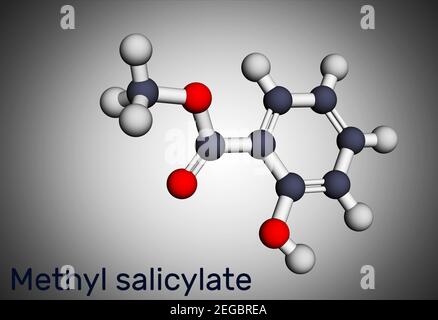 Methyl salicylate, wintergreen oil molecule. It is methyl ester of salicylic acid, flavouring agent, metabolite, insect attractant. Molecular model. 3 Stock Photo