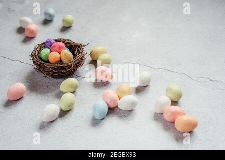Colourful Easter eggs on gray cement background Stock Photo