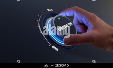 Enhancing innovation and technology development concept with a person choosing higher innovative products by turning a knob or dial by hand. Business Stock Photo