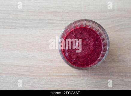 Blueberry cocktail (smoothie) in a glass on a wooden table Stock Photo