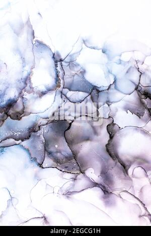 Abstract alcohol in background in smokey black, pink, and mauve tones. White background with space for text. Stock Photo