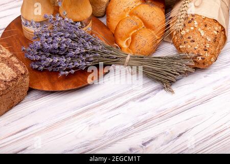 Composition with tasty lavender baking on wooden table. Lavender Stock Photo