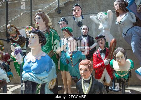 LONDON, UK - JUNE 29, 2019 A gorgeous collection of colorful ship figureheads on Cutty Sark  ship in London Greenwich area. The Long John Silver colle Stock Photo