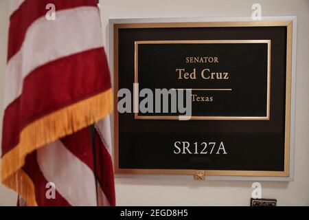 Bethesda, USA. 18th Feb, 2021. Senator Ted Cruz (R-TX) name plaque hangs at the entrance to his office inside of the Russell Senate Office Building on Thursday, February 18, 2021, in Washington, DC. Cruz has been accused of traveling to Cancun, Mexico, amid the ongoing crisis in Texas, where millions have been left without power or heat in freezing temperatures. (Photo by Oliver Contreras/Sipa USA) Credit: Sipa USA/Alamy Live News Stock Photo