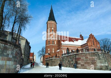 The 15th century Roman Catholic Church of Vytautas the Great with a ruler attached to the wall that shows how high the water can rise from Neman River. Stock Photo