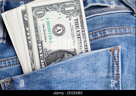 close up of dollar banknotes in a jeans pocket Stock Photo