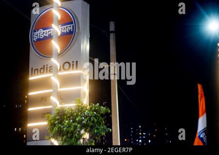 Night shot of indian oil petrol pump decorated with lights at night as prices of petrol increase to the highest ever prices in India Stock Photo
