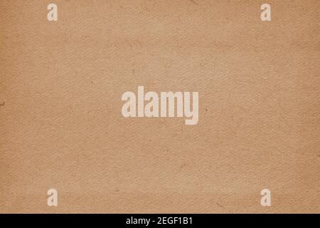 Texture of cardboard, old organic brown paper. Vintage background, copy space Stock Photo