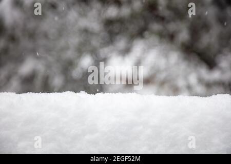 Winter snow background with empty space, Christmas holiday greeting card template. Snow pile and blur abstract backdrop Stock Photo