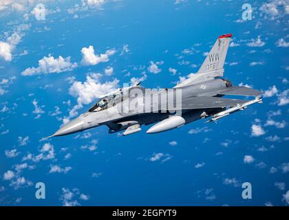 Guam, United States. 18th Feb, 2021. A U.S. Air Force F-16 Fighting Falcon fighter jet, assigned to the 13th Fighter Squadron, during exercise Cope North 21 February 18, 2021 near Guam. Cope North is an annual exercise was allies in the Indo-Pacific. Credit: Planetpix/Alamy Live News Stock Photo