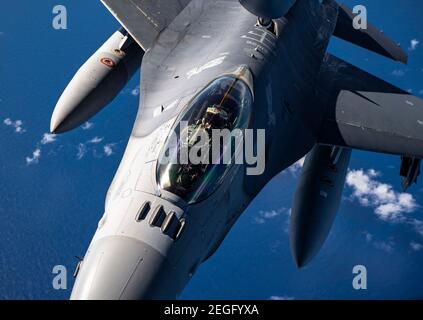 Guam, United States. 18th Feb, 2021. A U.S. Air Force F-16 Fighting Falcon fighter jet, assigned to the 13th Fighter Squadron, during exercise Cope North 21 February 18, 2021 near Guam. Cope North is an annual exercise was allies in the Indo-Pacific. Credit: Planetpix/Alamy Live News Stock Photo