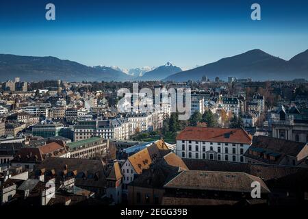 Aerial view of Geneva with Alps Mountains and Mont Blanc on background - Geneva, Switzerland Stock Photo