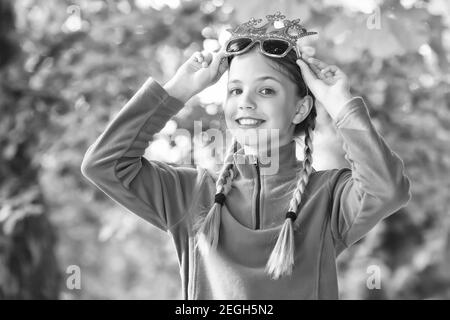 Girl wear fleece jumper for active leisure nature background, sunny day concept. Stock Photo