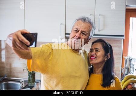 Happy couple at Valentines day taking a selfie Stock Photo