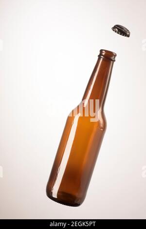 Glass bottle of rustic beer Stock Photo