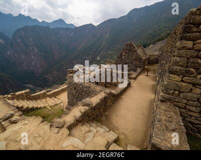 Machu Picchu Stone walls and andes mountain range on the bacground Stock Photo
