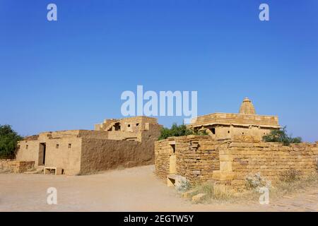 Old house and temple view of Kuldhara an abandoned village, Jaisalmer Rajasthan, India. Established in 13th century inhabited by Paliwal Brahmins. Stock Photo