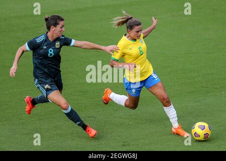 February 18, 2021: Orlando, Florida, USA: Brazil defender TAMIRES (6) competes for the ball against Argentina midfielder CLARISA HUBER (8) during the SheBelieves Cup Brazil vs Argentina match at Exploria Stadium. (Credit Image: © Cory Knowlton/ZUMA Wire) Stock Photo
