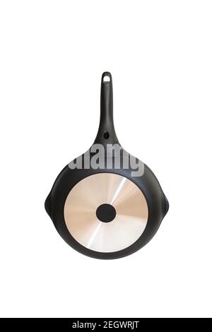 Frying pan rear, back view isolate on white background. Aluminum bottom of pan Stock Photo