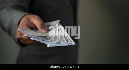 Income and Business  banking inetwork connection United States Dollars and money corruption finance profit, bail, crime Stock Photo