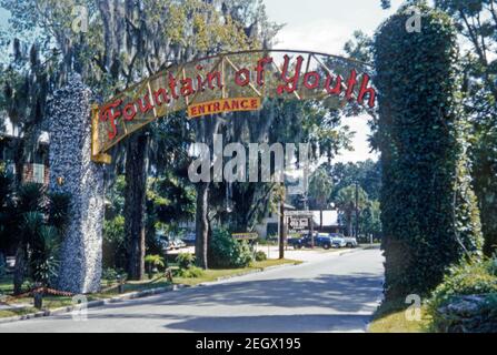 The neon arch at the entrance to ‘The Fountain of Youth’, an Archaeological Park, St Augustine, Florida, USA in the late 1950s. The history-themed park is privately owned 15-acre (61,000 sq m). It is located along Hospital Creek, part of the Intracoastal Waterway. The park contains a well, supposedly sought by Spanish Explorer Ponce de Leon. Archaeological excavations made in the 1990s uncovered remains of the first Spanish settlement and its fortifications in St Augustine. This image is from an old American amateur Kodak colour transparency. Stock Photo