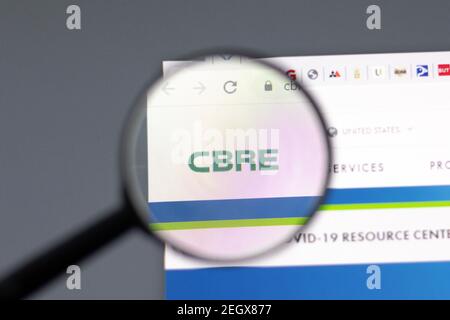 Close-up of CBRE logo on blue sign in window of a building, San ...