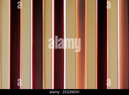 Curtain made of plastic strips in brown tones for background, designs elements, banners. Texture Stock Photo