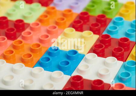 Pattern of colorful plastic cubes background close up view Stock Photo