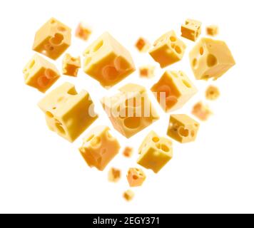 Cheese cubes in the shape of a heart on a white background Stock Photo
