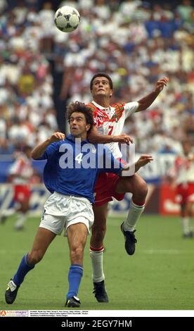 28/6/94. World Cup. Mexico v Italy. Alberto Garcia Mexico jumps over ...