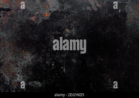 Black, corroded metal texture background with rusty parts Stock Photo