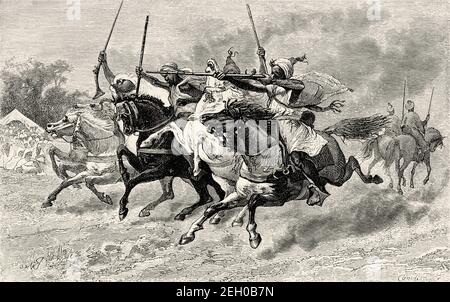 The Moroccan tradition of Fantasia. Lab al baroud. Unpowder game or Tbourida, is a stylized reenactment of a wartime cavalry charge, a celebration of the region's history and of the bond between horse and rider. Morocco, North Africa. Old 19th century engraved illustration from El Mundo Ilustrado 1879 Stock Photo