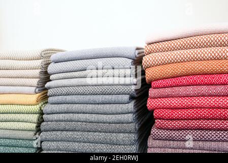 stacks of colorful fabrics Stock Photo