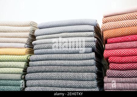 stacks of colorful fabrics Stock Photo