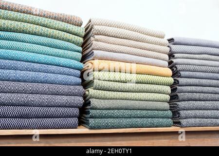 stacks of colorful fabrics Stock Photo