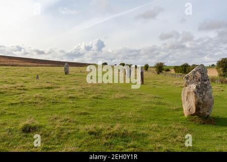 View up the West Kennet Avenue of sarsen stones leading towards Avebury Henge & Stone Circles site, Wiltshire, England. Stock Photo