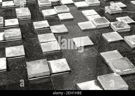 Water that is soaked on the floor of the multi-level blocks Stock Photo