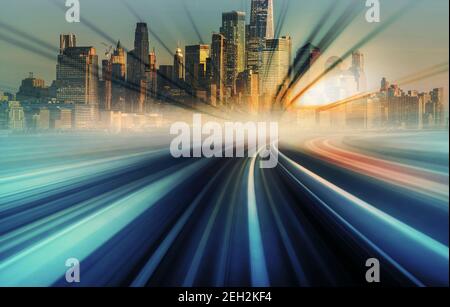 Blur Motion moving from japan train monorail heading to New York Cityscape with sunset ray background, United States, Automotive and elevated road, in Stock Photo