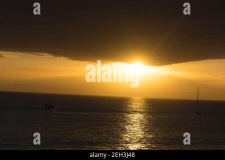 Background of colorful sky concept: dramatic sunset with twilight color sky and clouds. Stock Photo