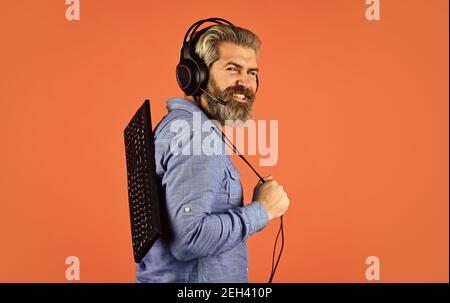 Superior performance. Graphics settings pushed to limit. Play computer games. Online gaming. Modern leisure. Run any modern game. Shop gadgets. Hipster gamer headphones and keyboard. Gaming addiction. Stock Photo