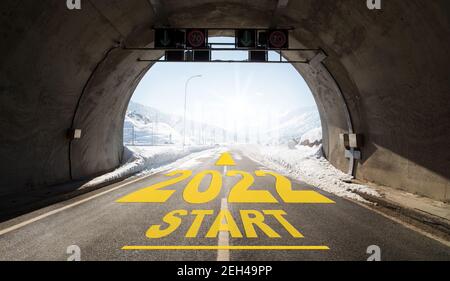 The year 2022 written on tunnel asphalt. New year start time concept