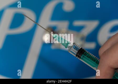 Covid-19 or coronavirus vaccine in doctor hands, ampoules of vaccine, new vaccine by Pfizer Stock Photo