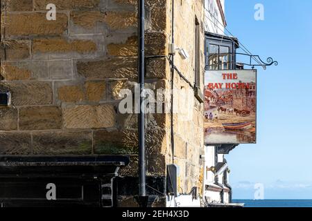 Pub sign for the Bay Hotel, Robin Hood's Bay, Yorkshire, England Stock Photo