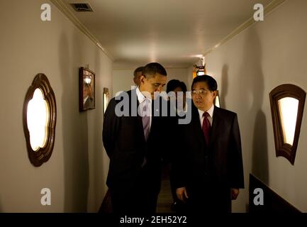 President Barack Obama walks with Chinese President Hu Jintao at Diaoyutai State Guest House in Beijing, China, Nov. 16, 2009. Stock Photo
